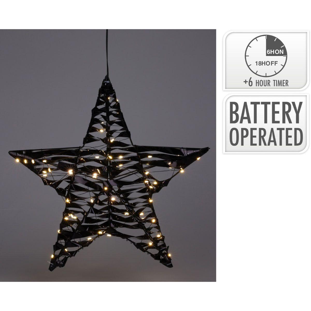 Black 40 cm Lighted Christmas Star With 60 Warm LED Lights For Festive Decor On An Etagere Shelf.
